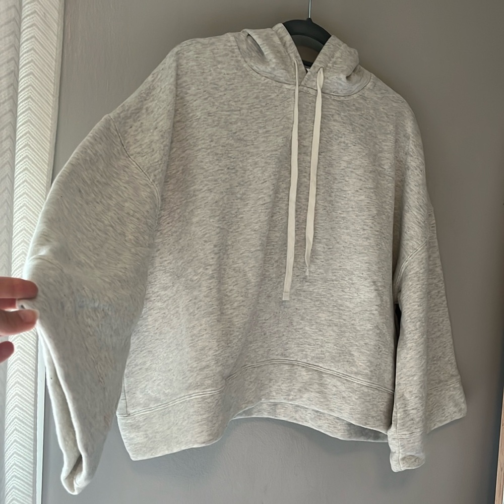 Boutique brand, light grey, crop hoodie with 3/4 wide sleeves. Never worn